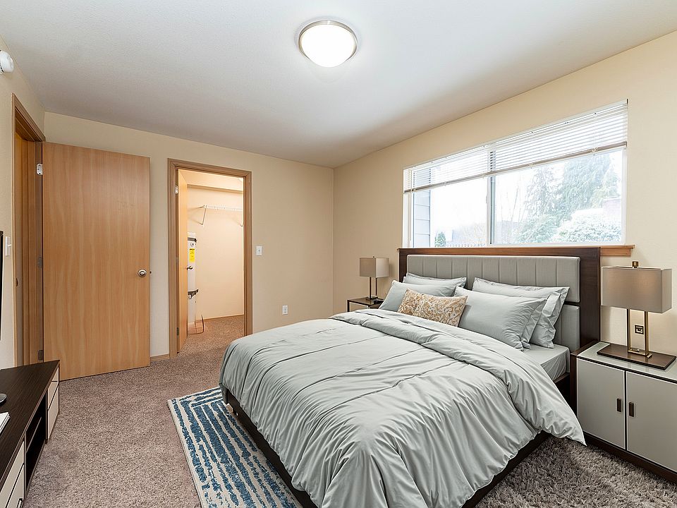 Experience peaceful nights in this cozy bedroom haven, complete with modern amenities.