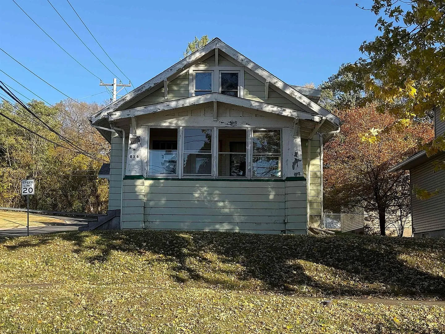 Charming 3-Bedroom Home with Enclosed Porch and Basement! — Photo 2