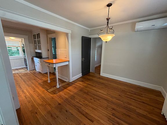 Galley kitchen and dining area.