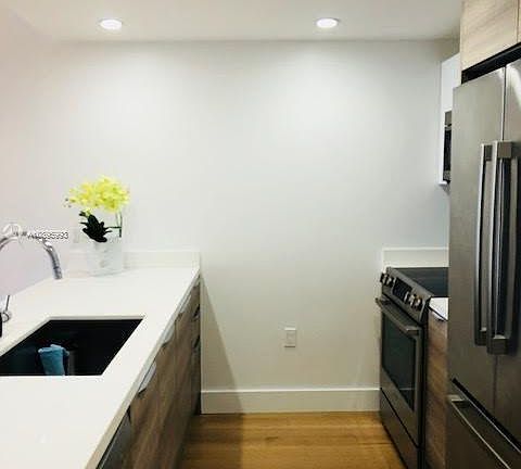 2nd image of 9940 W Bay Harbor Dr #5B