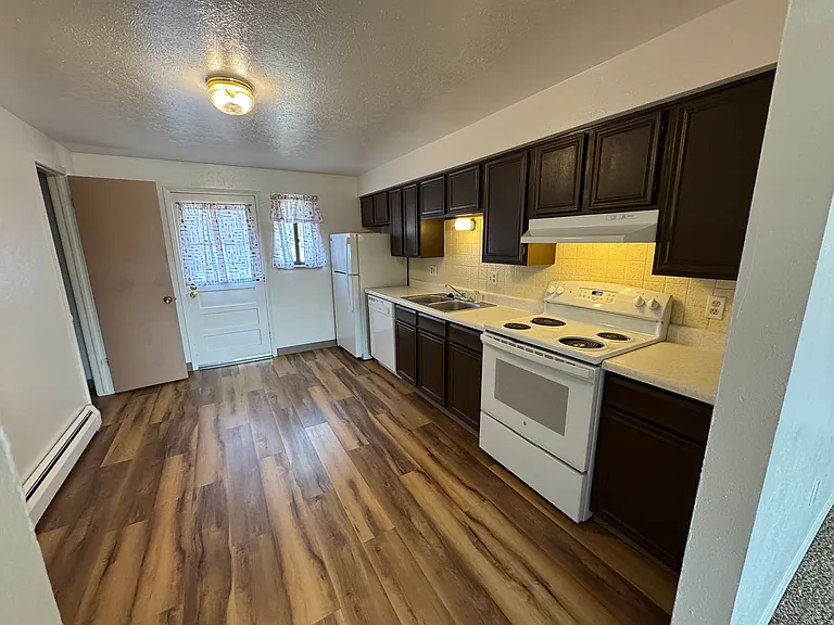 Updated with LVP, newer appliances and 2 pantries.