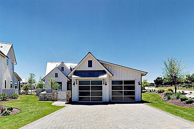 Two car detached garage and extra long driveway allow parking for 6 vehicles or can accommodate boat trailer or golf cart