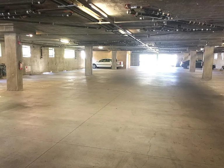 Secured 1 Car Assigned Parking Space