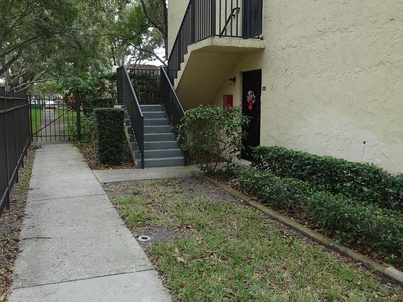 Private downstairs end unit entrance. 
Gated inner courtyard