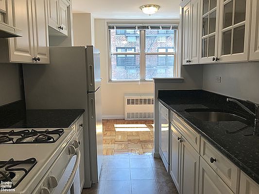 5th image of 222 E 19th St APT 4A