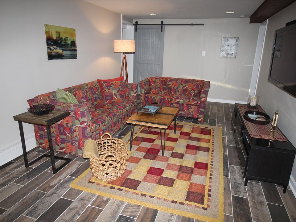 Living Room has flat-screen TV with access to HBO. Netflix, ESPN and more! Completely furnished throughout apartment.
