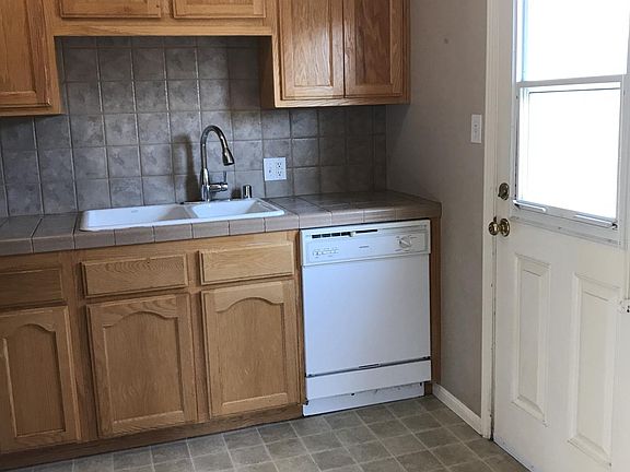 Kitchen & backdoor leading to private patio