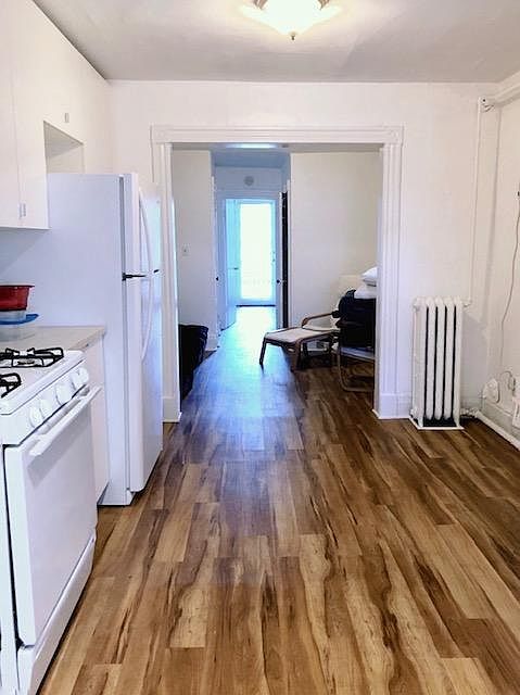View from dine-in kitchen at back of apartment running through to bedroom at front of apartment