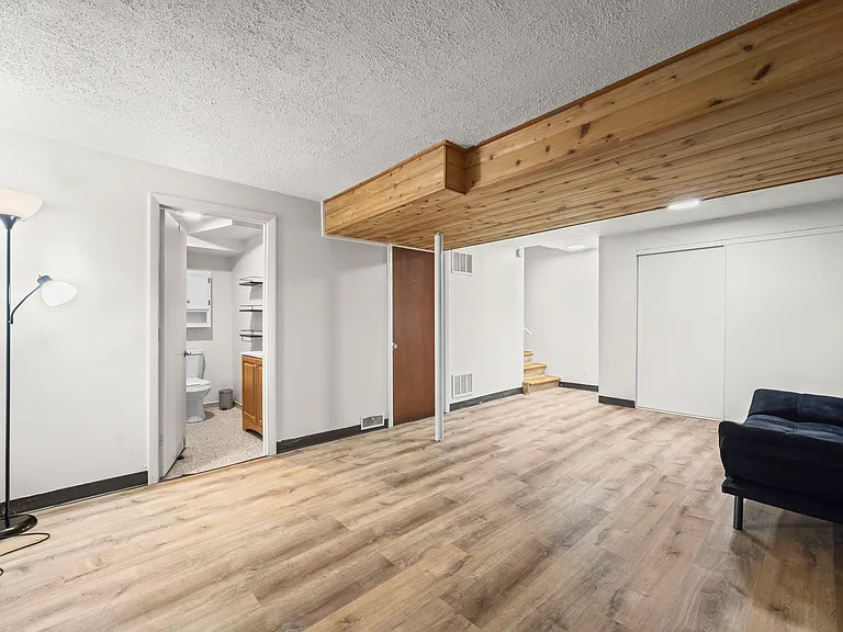 Spacious finished basement with a full bathroom and versatile bonus room, perfect for a guest suite, home office, gym, media room, or additional living space.