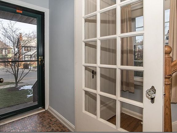 Front Door Entry with a closet at the base of the stairs