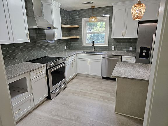 Lots of cabinets and countertop space