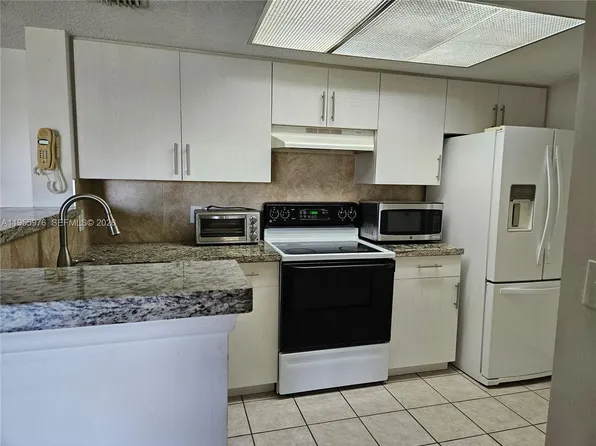 5011 Wiles Rd APT 306, Pompano Beach, FL 33073