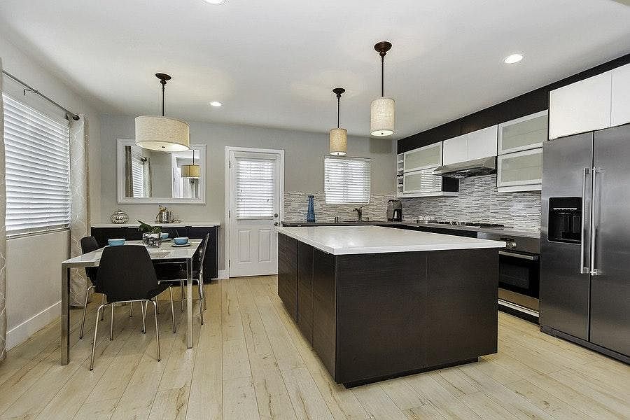 Large custom kitchen with expansive center island and plenty