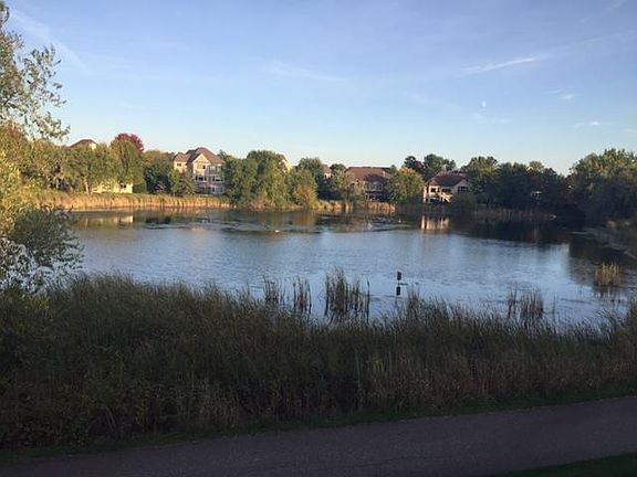 Another view of pond and walking path.