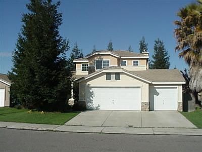 Front with 2 mature redwoods