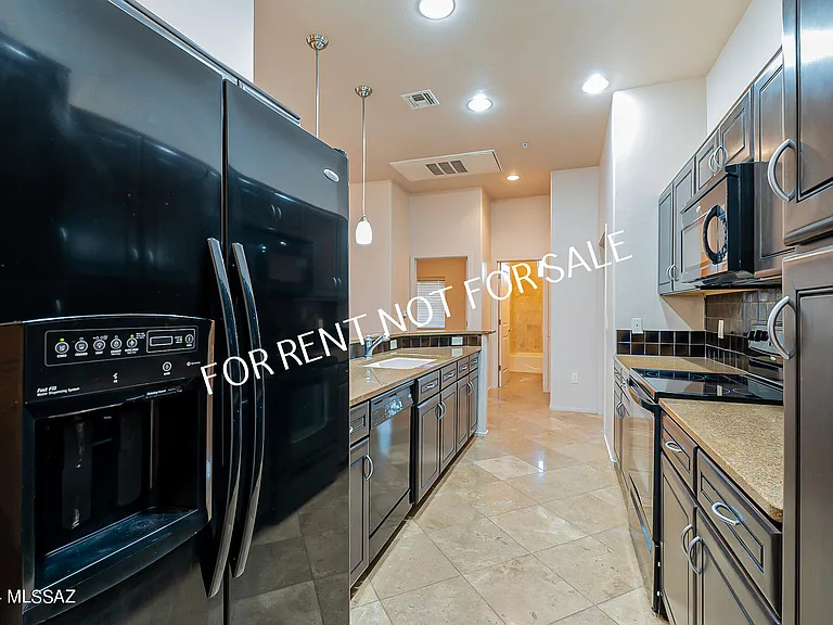 2010 E River Rd #203 — Photo 11