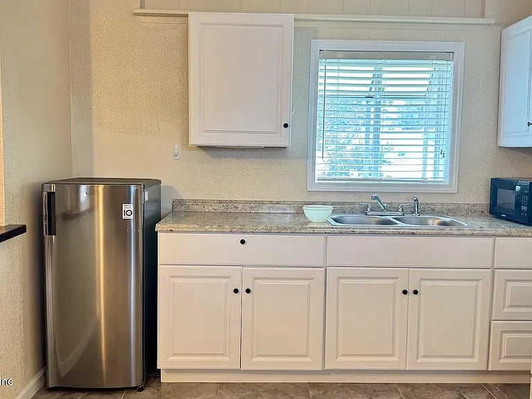 5557 Floral Ave — Photo 18