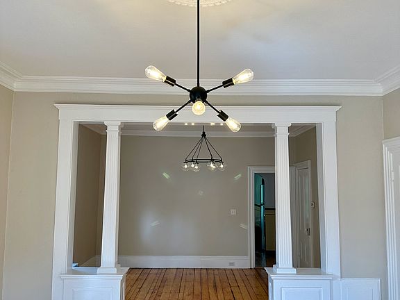 Living Room/Dining Room double parlor with historical architectural details
