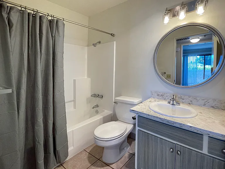 Coordinated second bathroom with custom finishes