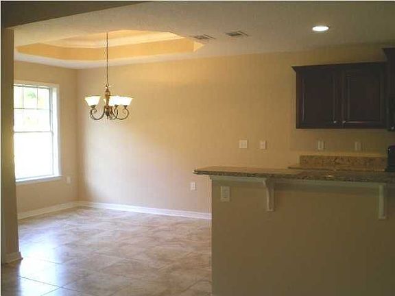 Dining area has 20" Porcelain tile floors!
