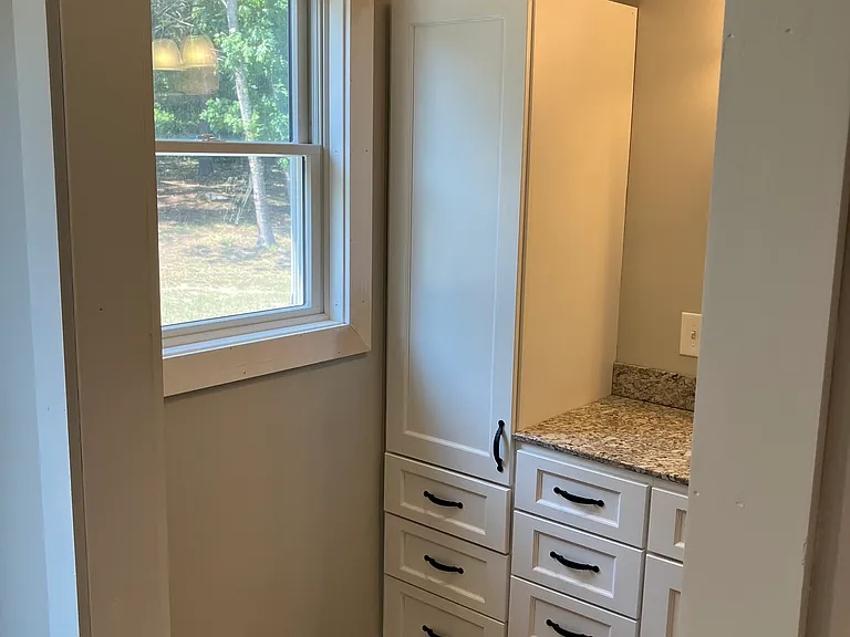 Additional cabinets in master bathroom