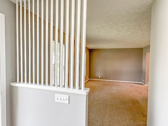 Foyer and view of living room