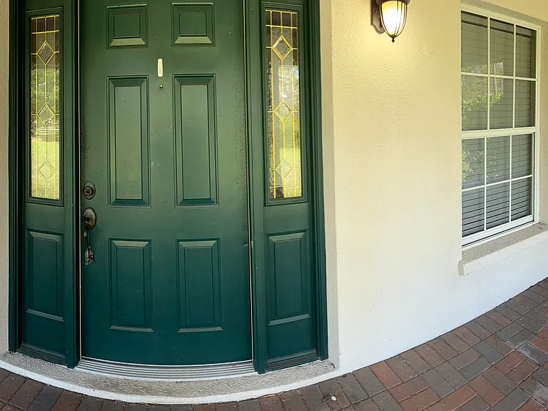 Front door and screened in front porch