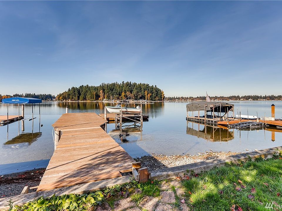 View of Dock From Bulkhead looking out onto American Lake and Silcox Island.