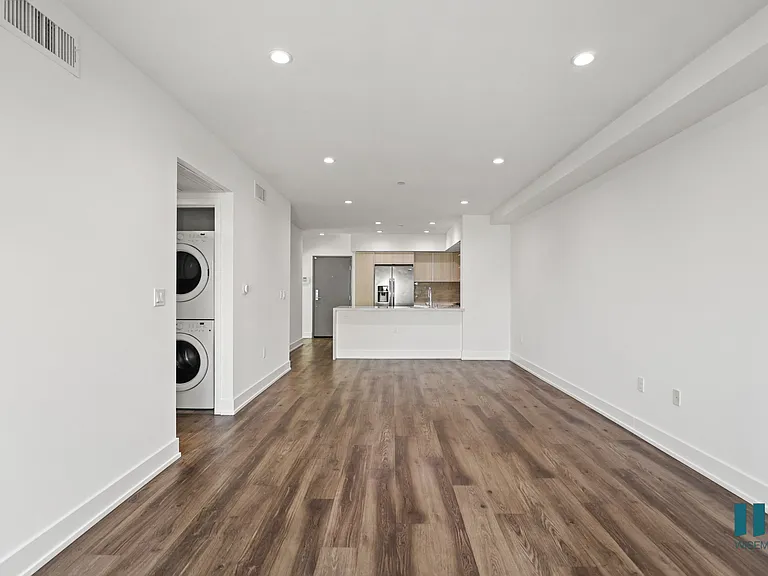 Open-Concept Kitchen, Dining, and Living Room Areas