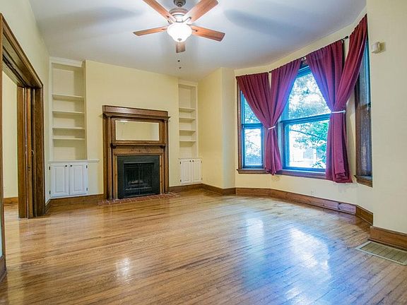Living room with decorative fireplace