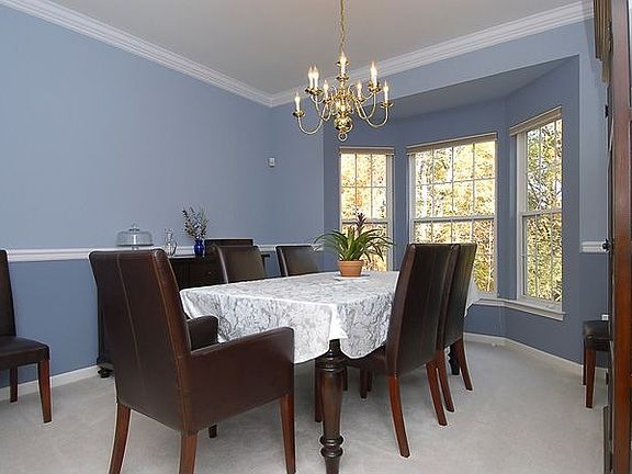 Dining Room - Bay Window, New Paint, Crown Molding and Chair Rail