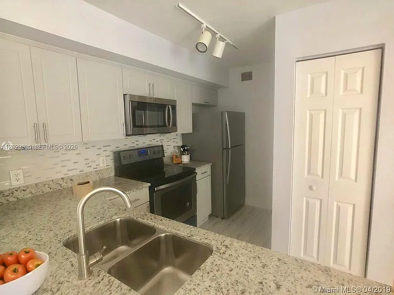 11155 SW 5th Pl #306 — Photo 4