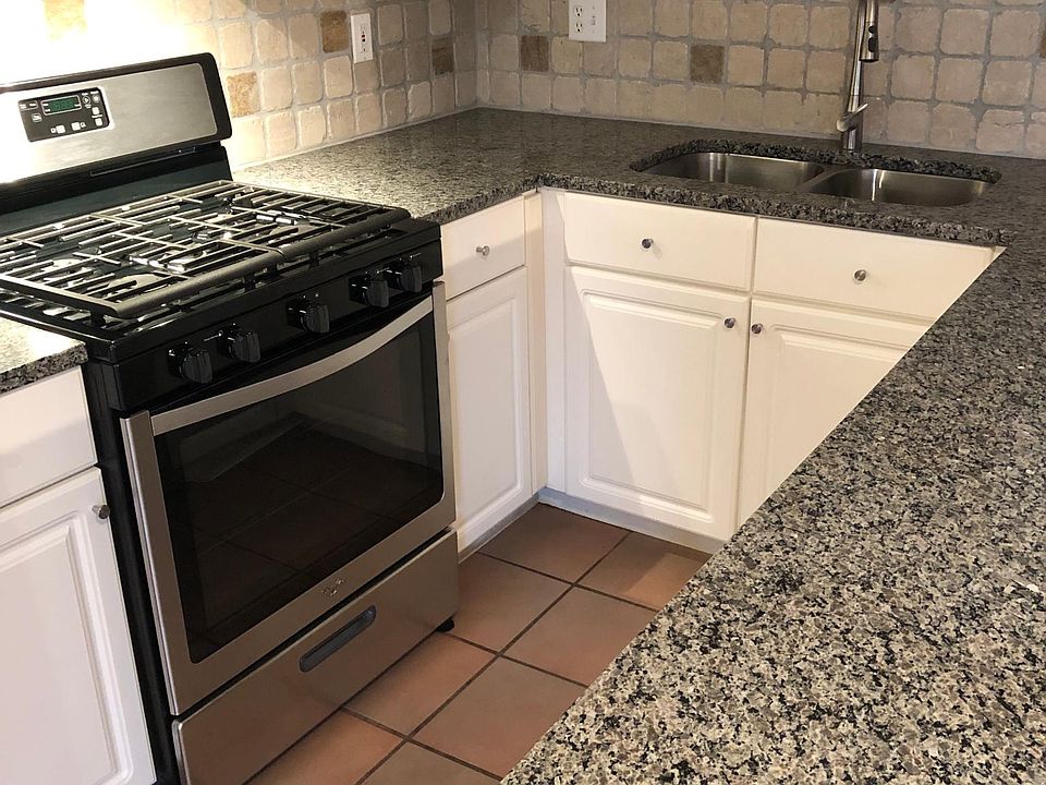 new pull-out faucet, sink,range hood, gas range, fridge w ice maker