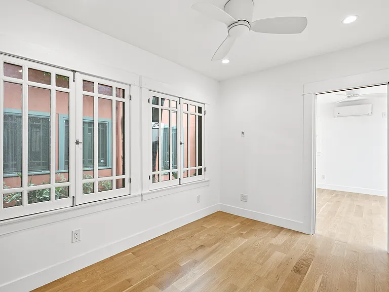 View of the bedroom and the entrance into the living room