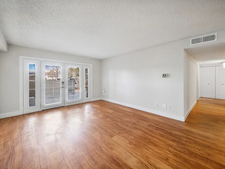 Large living room with wood floors