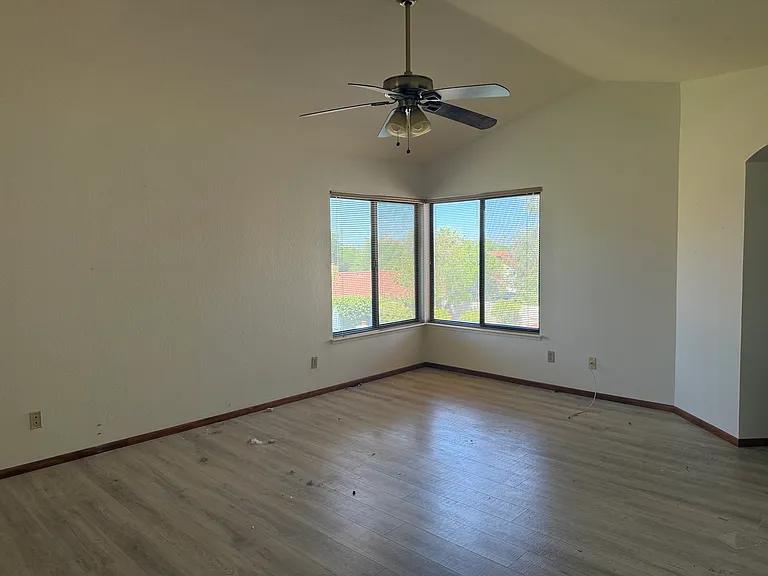 Master bedroom, opens to master bath. Ceiling fan.