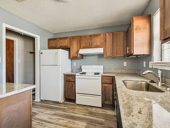 Granite Counter tops and backsplash, new sink and faucet.