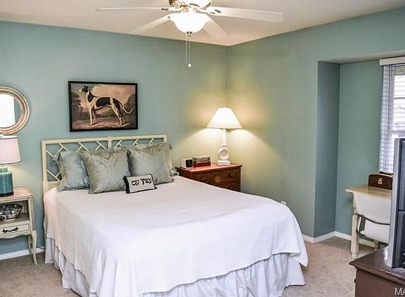Master bedroom with new carpet.