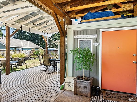 View of the front entry and expanded outdoor deck