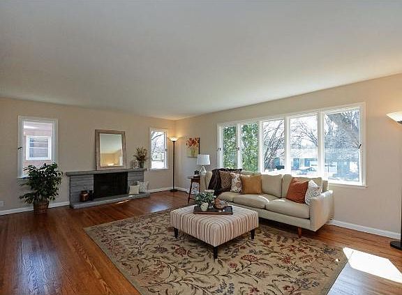 upstairs living room with lots of windows