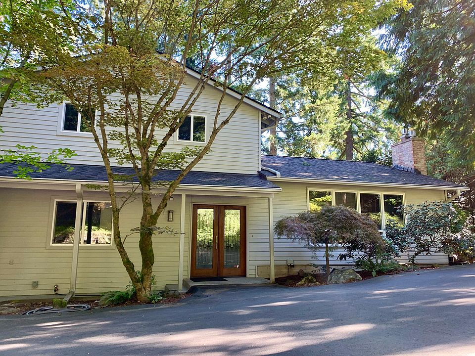 Easy access with a generous driveway and parking area. Situated in a private cul-de-sac with mature landscape and beautiful trees.