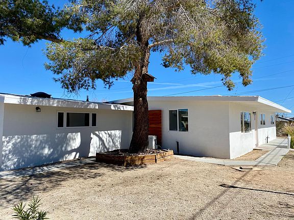 Modern Smooth White Plaster Finish, Exterior of Home