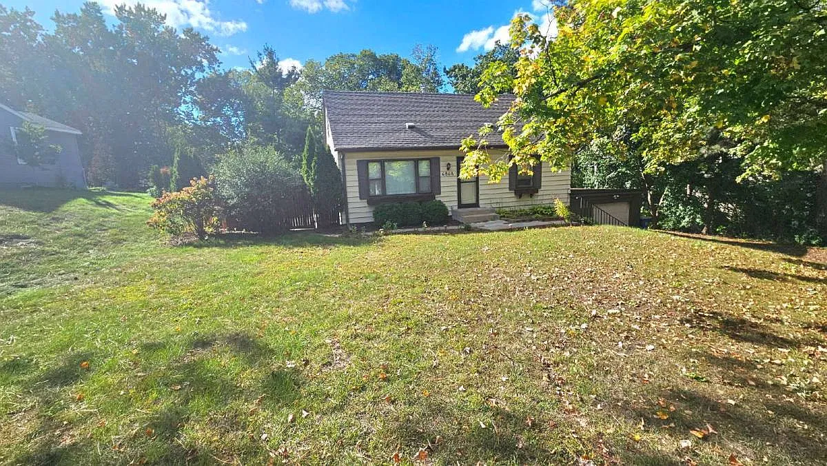 4846 Birchwood Lane in Hopkins, MN 55343 — Photo 1