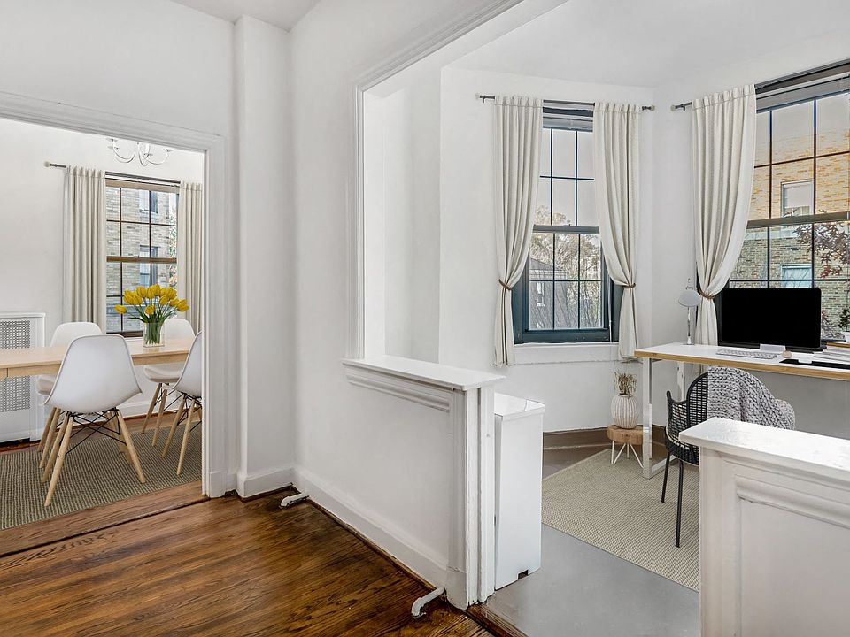 Dining and sunroom (virtually staged)