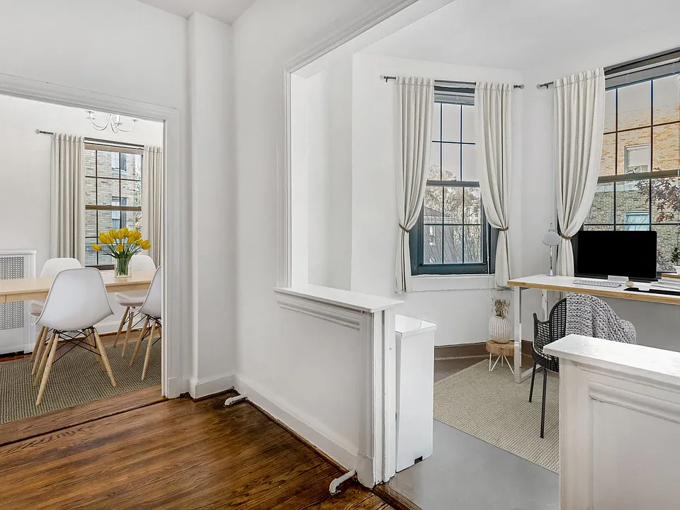 Dining and sunroom (virtually staged)