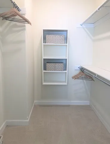 Walk-in closets with sweater shelves Walk-in closets with sweater shelves