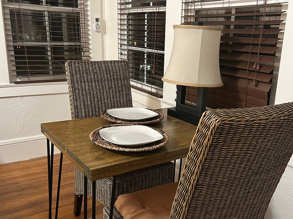 Peaceful dining or working in the windowed alcove overlooking a lovely tree lined street.