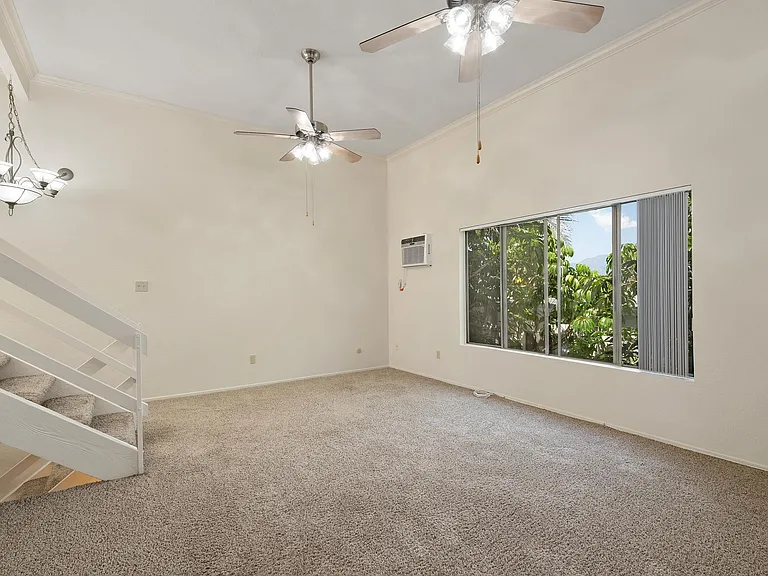 Living Room with High Ceilings on Level 3