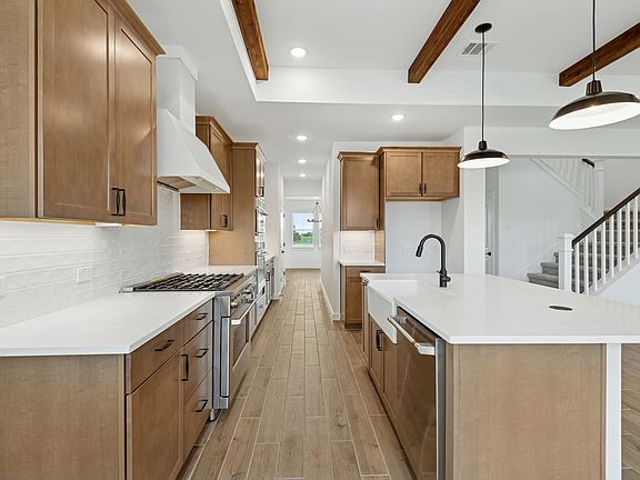 Kitchen with white apron-front sink