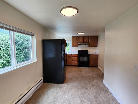 View from living room towards dining and kitchen.